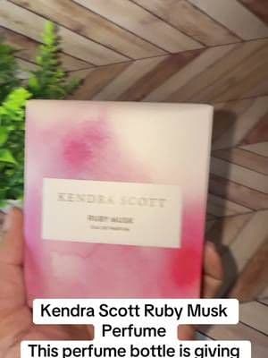 Kendra Scott's Ruby Musk perfume comes in an elegant 2.5oz bottle with a beautiful gold-toned cap. A gorgeous fragrance addition to your vanity or gifting lineup. ✨ #KendraScott #RubyMusk #PerfumeFinds #FragranceCollection #TikTokShop