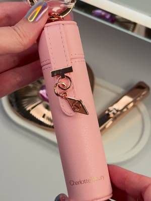 Miss @Charlotte Tilbury at this point you need to release an accessories line because they are ALWAYS so adorable! Look at this Lip Tint Case 🎀 Get yours too by purchasing the new Pillow Talk Blush Balm Lip Tint. You can use the link & code on my bio 💕 #ad #charlottetilbury #charlottetilburymakeup #lipstickcase #magicbeautystars