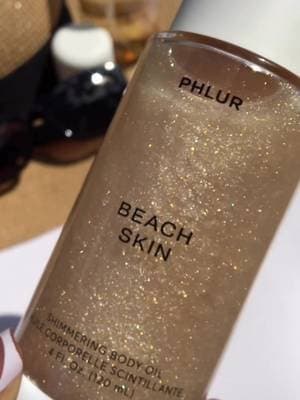 If you want that instant “vacation skin” glow… this is the one ✨ The PHLUR Beach Skin shimmering body oil = glassy, sun-kissed skin in seconds 🌴💛 @Phlur Fragrances #phlur #phlurbeachskin #phlurshimmeringbodyoil #phlurfragrance #tiktokshop
