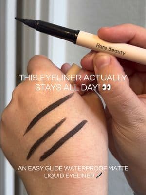 A matte black liquid eyeliner that gives smooth, precise strokes every time ✍🏽 The @Rare Beauty Perfect Strokes liner features a flexible brush tip for thin lines or bold wings, with a long-lasting waterproof formula that won’t flake, fade, or feather. #rarebeauty #liquidliner #wingedliner #tiktokshopsparkcreator #softglammakeup