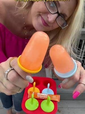 POV: you just found the fun way to level up summer 🍊❄️ I turned Dunkin’ Refreshers Singles To Go into easy homemade popsicles for a refreshing pick-me-up. Simple, tasty, and such a smart swap when you want something cool on hot days. Would you try these? #SummerTikTok #TikTokMadeMeBuyIt #HealthySwaps #EasyRecipes #ViralFinds